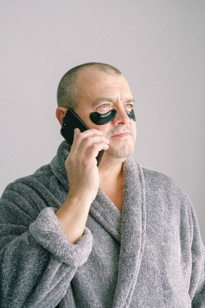 man relaxing in bathrobe
